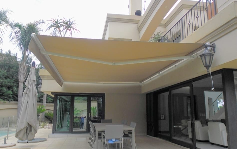 Retractable awning installed over patio
